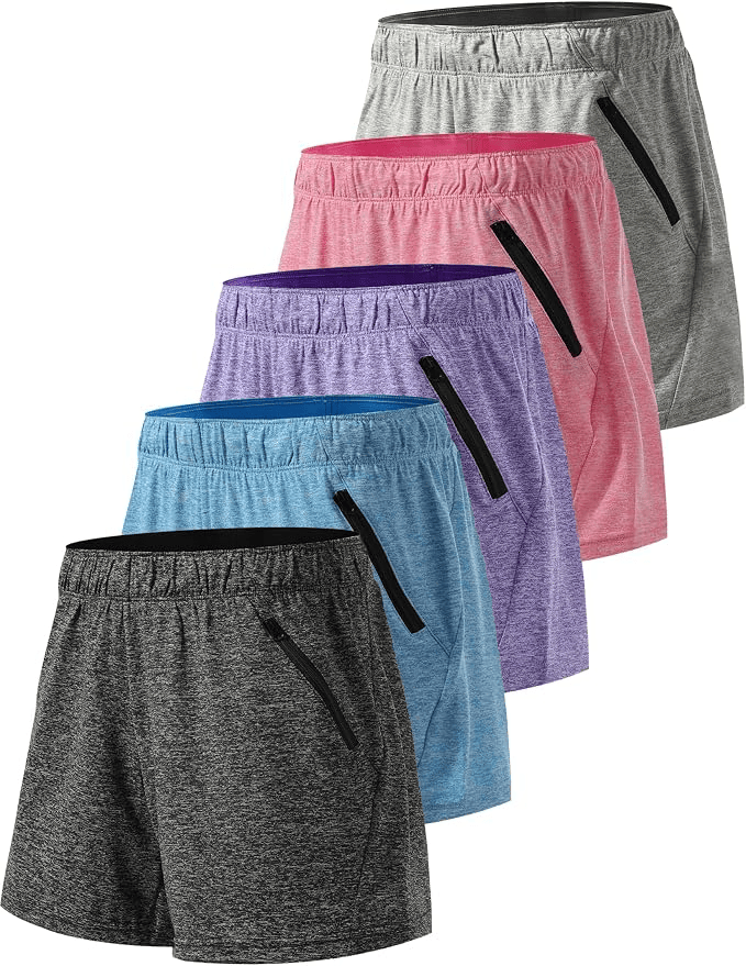 Five pairs of athletic shorts in various colors including gray, pink, purple, blue, and black, arranged in a row.