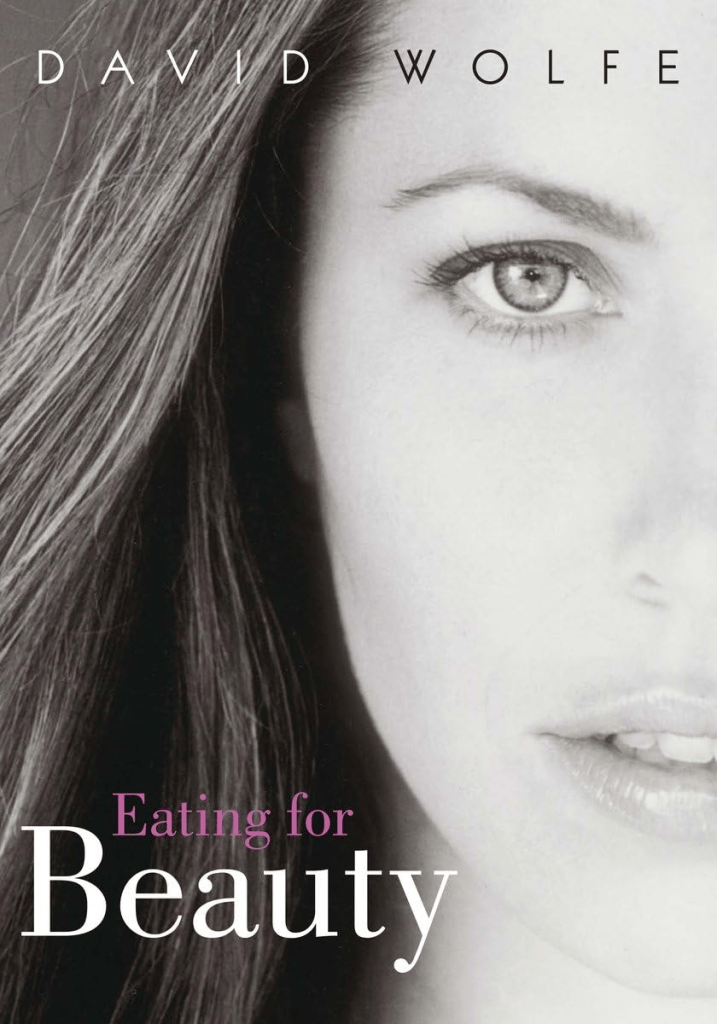Cover of the book 'Eating for Beauty' by David Wolfe featuring a close-up black and white photograph of a woman's face.