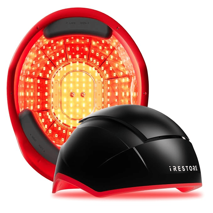 A red light therapy device featuring a large red panel with LED lights and a black helmet labeled 'iRestore' designed for hair restoration treatment.