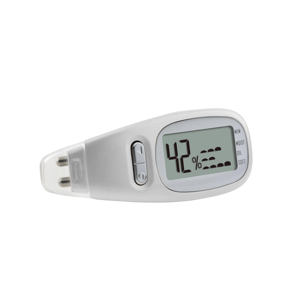 A digital moisture meter displaying a reading of 42% on its screen, featuring buttons for operation.