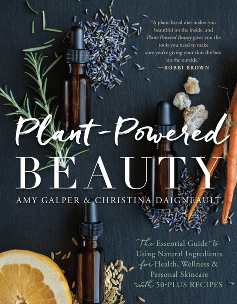 Cover of the book 'Plant-Powered Beauty' by Amy Galper and Christina Daigneault featuring essential oil bottles, herbs, and ingredients for natural skincare.